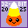 A candy corn with a smiling face, behind it is the words '32-bit 2025'