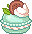 teal macaroon with whipped cream topping